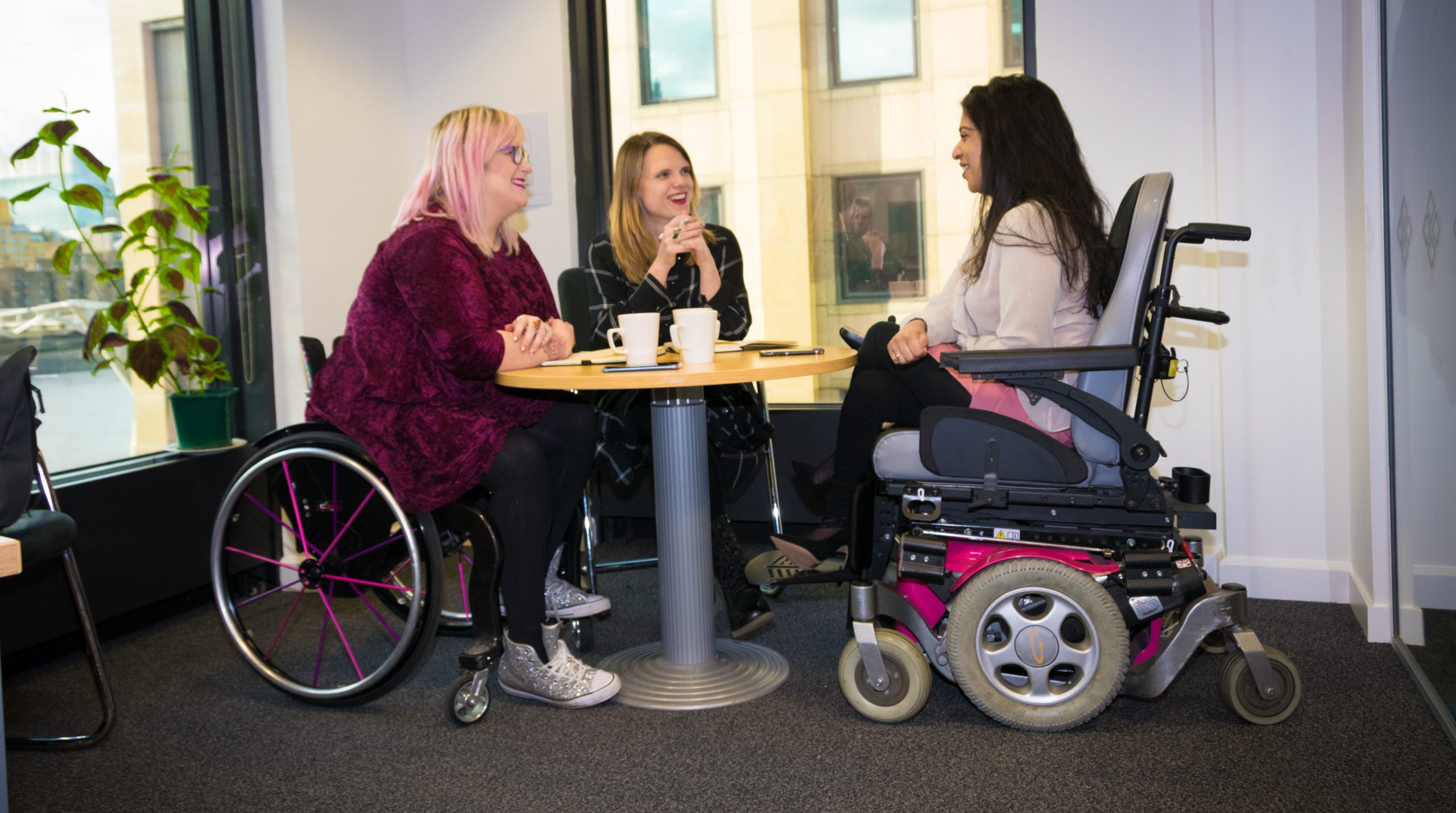 Jen, Em and Nima meeting room